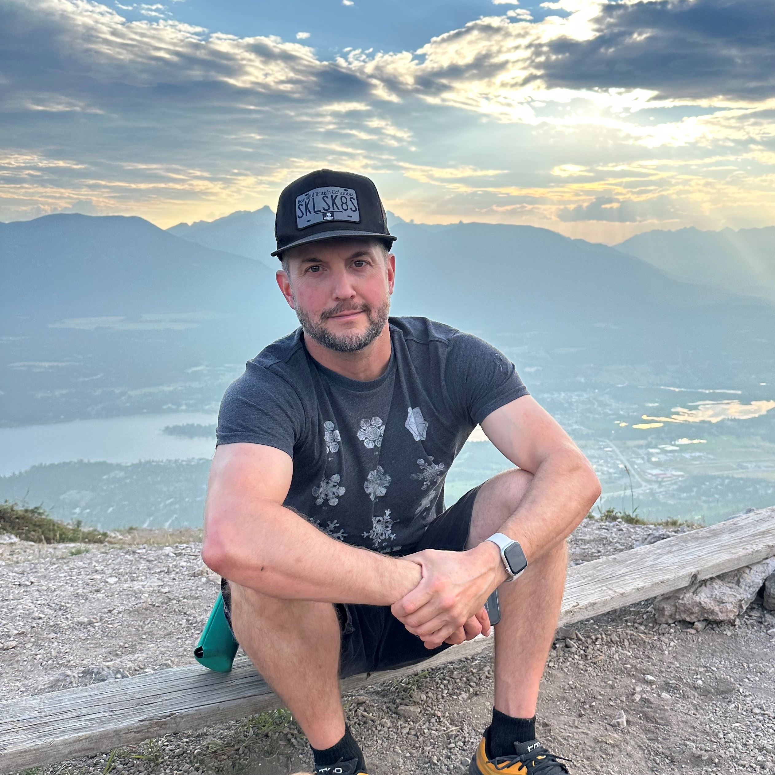 The new CED Director, Ryan Watmouth, sitting atop Mount Swansea